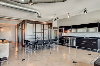 Kitchen featuring light tile patterned floors, dar