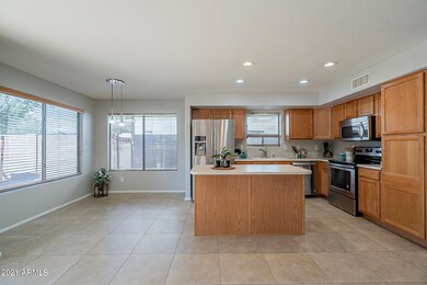 Dining area overlooks backyard