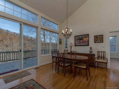 Dining area flows out to wide deck to enjoy fresh 