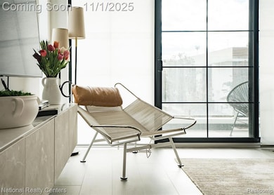 Living room featuring a wall of additional end unit windows