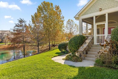 Screened in side porch with lake views