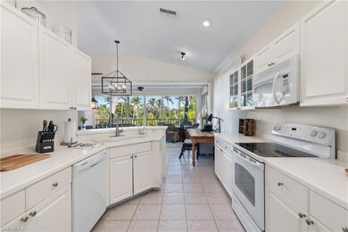 The kitchen opens to the lanai, so that the 