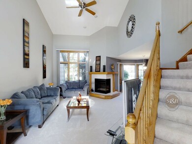 ALTERNATIVE VIEW 2-STORY FOYER AND LIVING ROOM