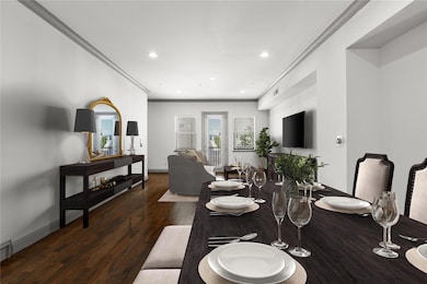Dining area featuring dark hardwood / wood-style f