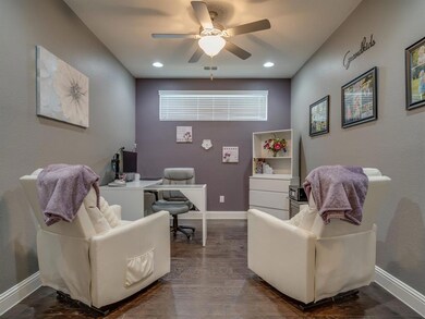 Behind French doors with shades find an executive 