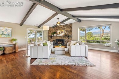 Great room featuring magnificent views from the windows & cozy gas fireplace
