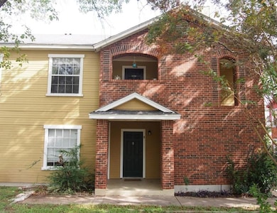 View of front of house featuring brick siding