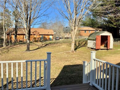 Storage building for storing lawn mower and yard tools