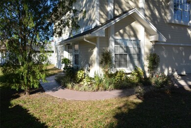 Front walkway leading from the driveway to the private side entrance