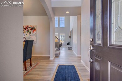 Entryway featuring light hardwood / wood-style flo
