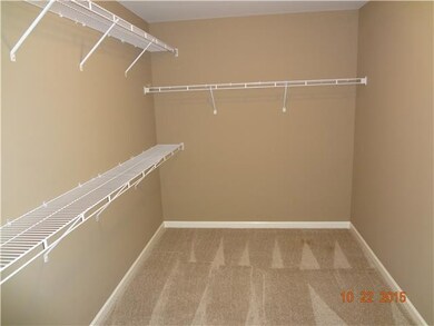One of the walk-in closets upstairs stock photo