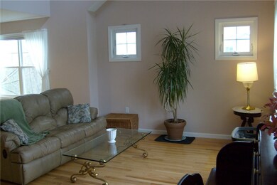 Livingroom has soaring ceiling