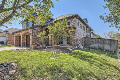 View of front of property with a garage and a fron