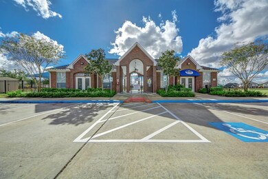Neighborhood clubhouse with a sparkling pool, offe