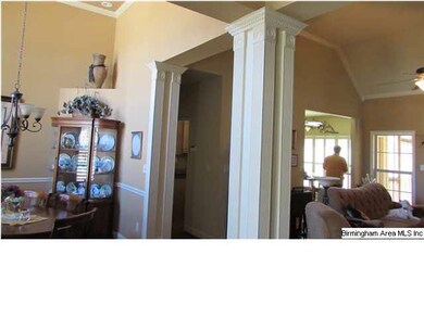 Custom built columns separate the great room and d