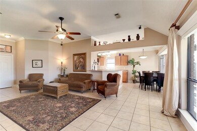 Living Area, Kitchen w/ breakfast bar and dining a