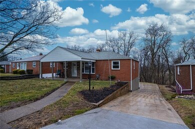 Amazing driveway with newer retaining wall and win