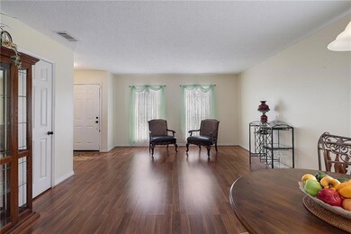 View of formal Living Area and Foyer from the Dini