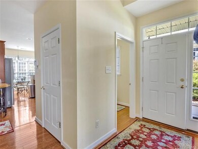 Foyer is two story with powder room nearby!