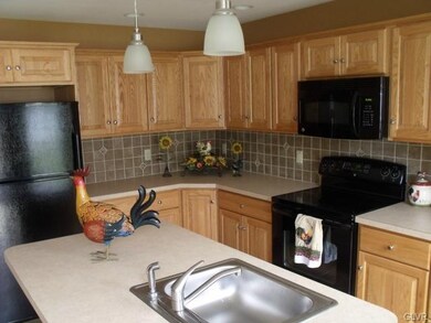 Model Pictured... 1st floor kitchen with center is
