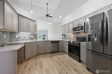 Kitchen with new cabinets and new quartz counter tops