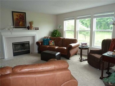 Great Room. Pretty Fireplace in the Great Room - Windows Overlook the Private Backyard.