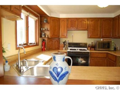 Kitchen. Check out the double sink and gas stove i