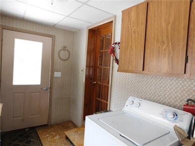 Side entrance to mud room. This brings you into th