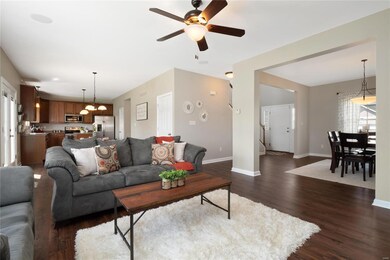 Living room opens to dining room, breakfast room a