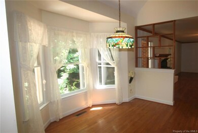 Casual dining off FR with fireplace