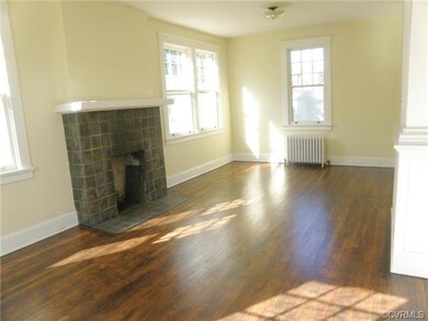 Original fireplace in the living room.