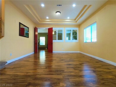 Large family room with double trayed ceilings, rec