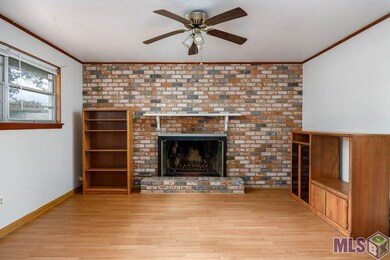 Gas assist wood burning fireplace