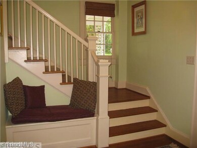 Other. Beautiful stairwell with refinished hardwood flooring. Per seller, there is hardwood flooring under the carpet on the 2nd level except the 3rd bedroom.