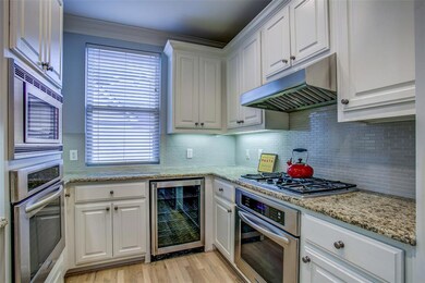 Efficient kitchen with loads of cabinets, two oven