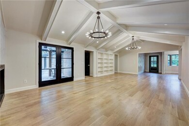 Living Room, Entry, and doors to back patio