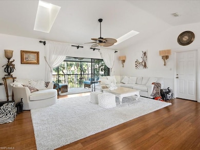 The entire great room opens to the lanai