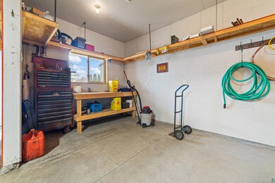 Garage featuring a workshop area