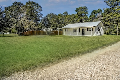 Huge Clean Yard and long driveway leading to your carport