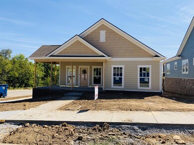 The Bryson, on the best corner homesite in the Community, tree save area and views from wrap porch and rear covered porch, 3 bedroom, 2 bath,  selections are completed