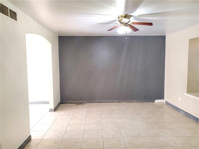 Living room has an accent wall...