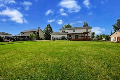 View of yard with wooden deck