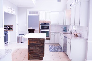 You will love the custom design in this kitchen! B