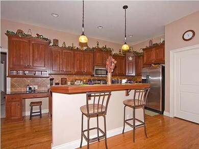 Island & eating bar. Spacious kitchen featuring gr