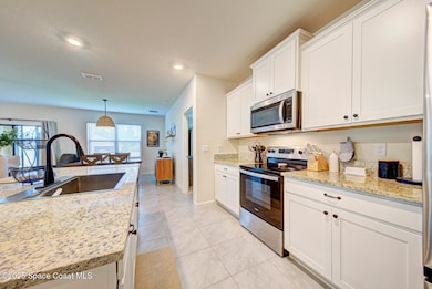 1342 Mineral Loop Dr NW, Palm Bay, FL 32907 - photo 4