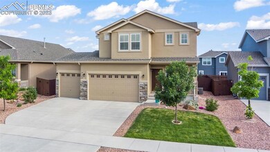Beautifully maintained stucco and stone home with front porch!