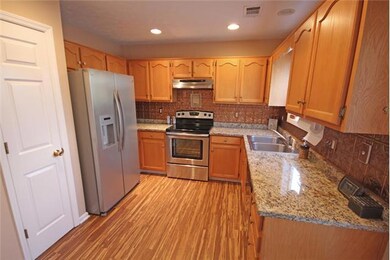 Open Kitchen with Stainless Steel Appliances