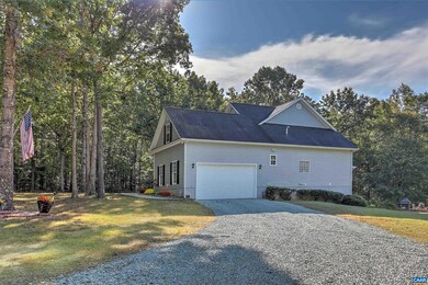 Large  2 car garage boasts high ceilings and ample