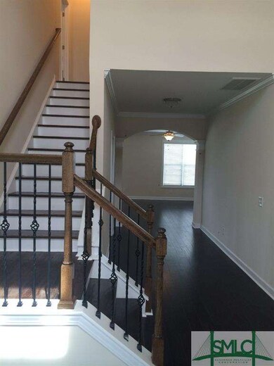 Beautiful, grand two-story foyer showcasing beauti
