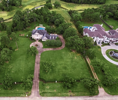 Fully gated property with a gated private drive, m